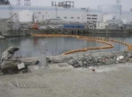 Japan may raise severity of nuclear crisis to top level: report 