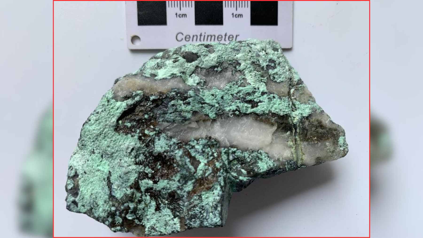 Jinxiuite discovery site rock sample from the Longhua nickel-cobalt deposit in Guangxi, China, shown with a centimeter scale.