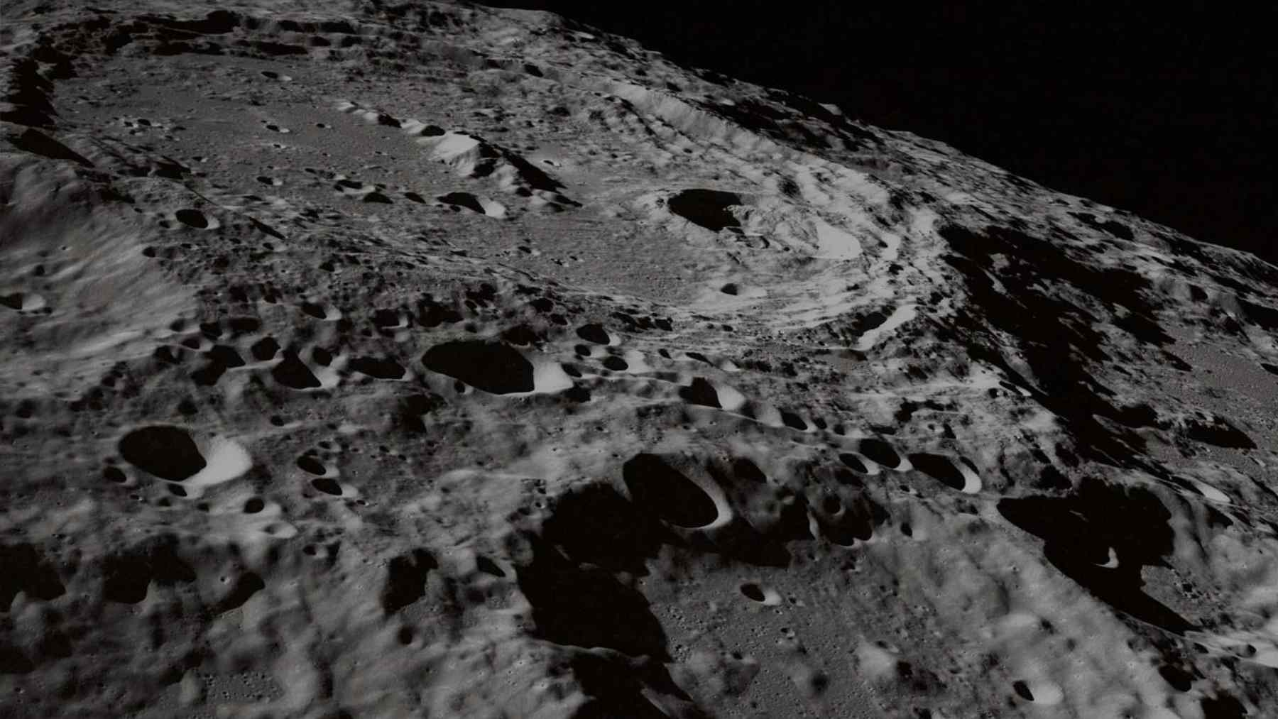 Cratered Moon surface in shadow, illustrating the lunar night side where a brief impact flash was recorded.