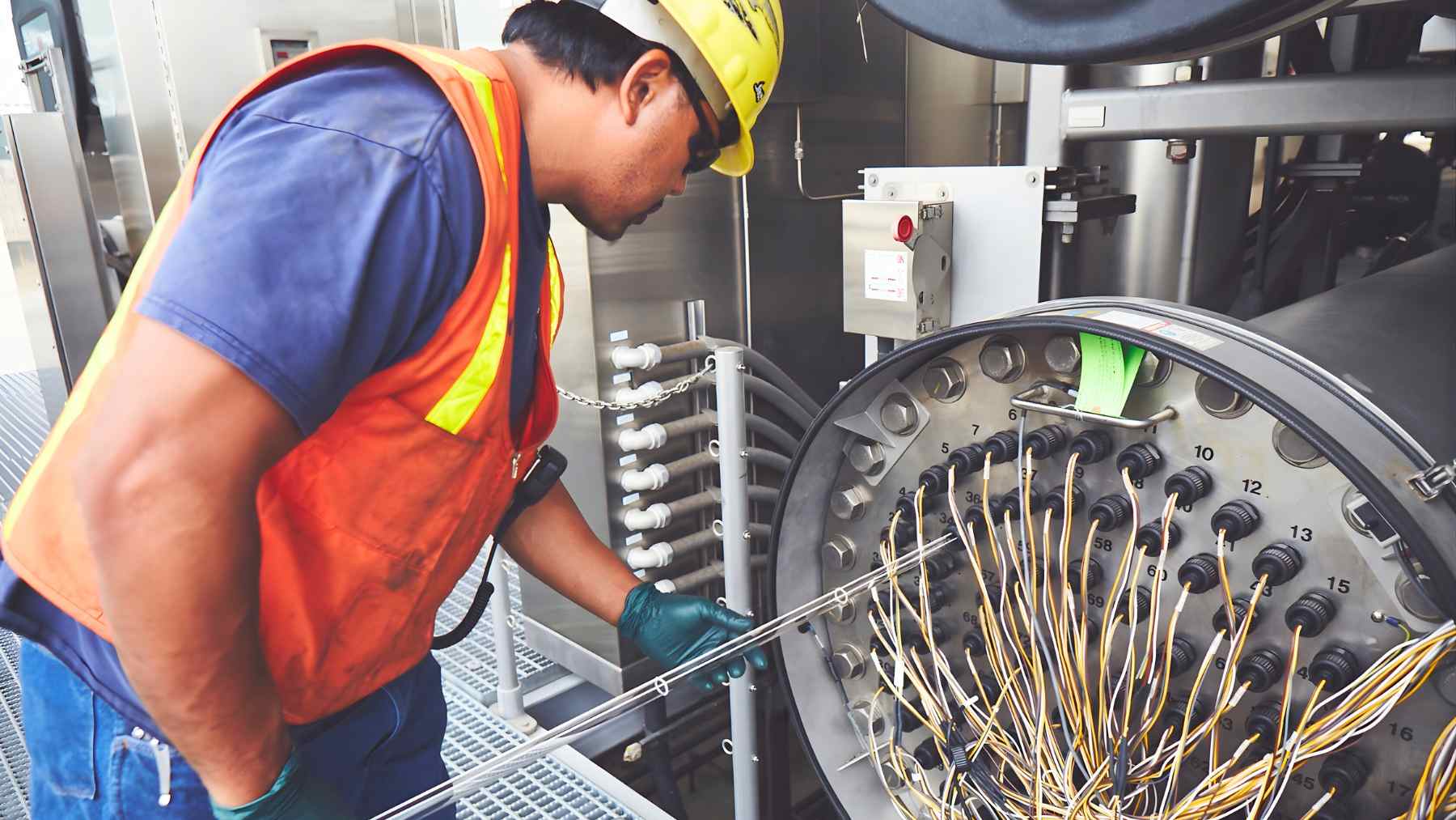 California's new water plan sounds like science fiction: plants that consume millions of tons of seawater and factories that convert wastewater into drinking water 1 Technician in a hard hat inspects UV disinfection equipment inside a California advanced wastewater treatment facility.