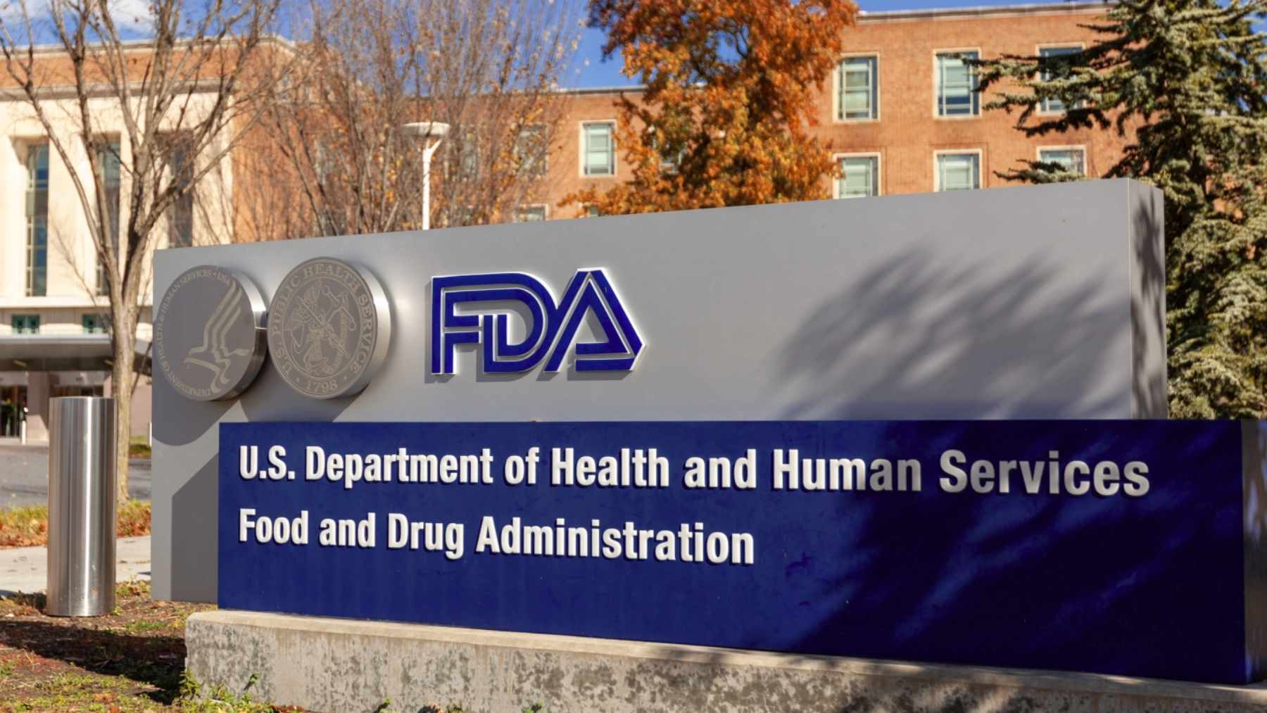 FDA headquarters sign in Maryland, site of Class I recall announcement on grated cheese over Listeria contamination risk