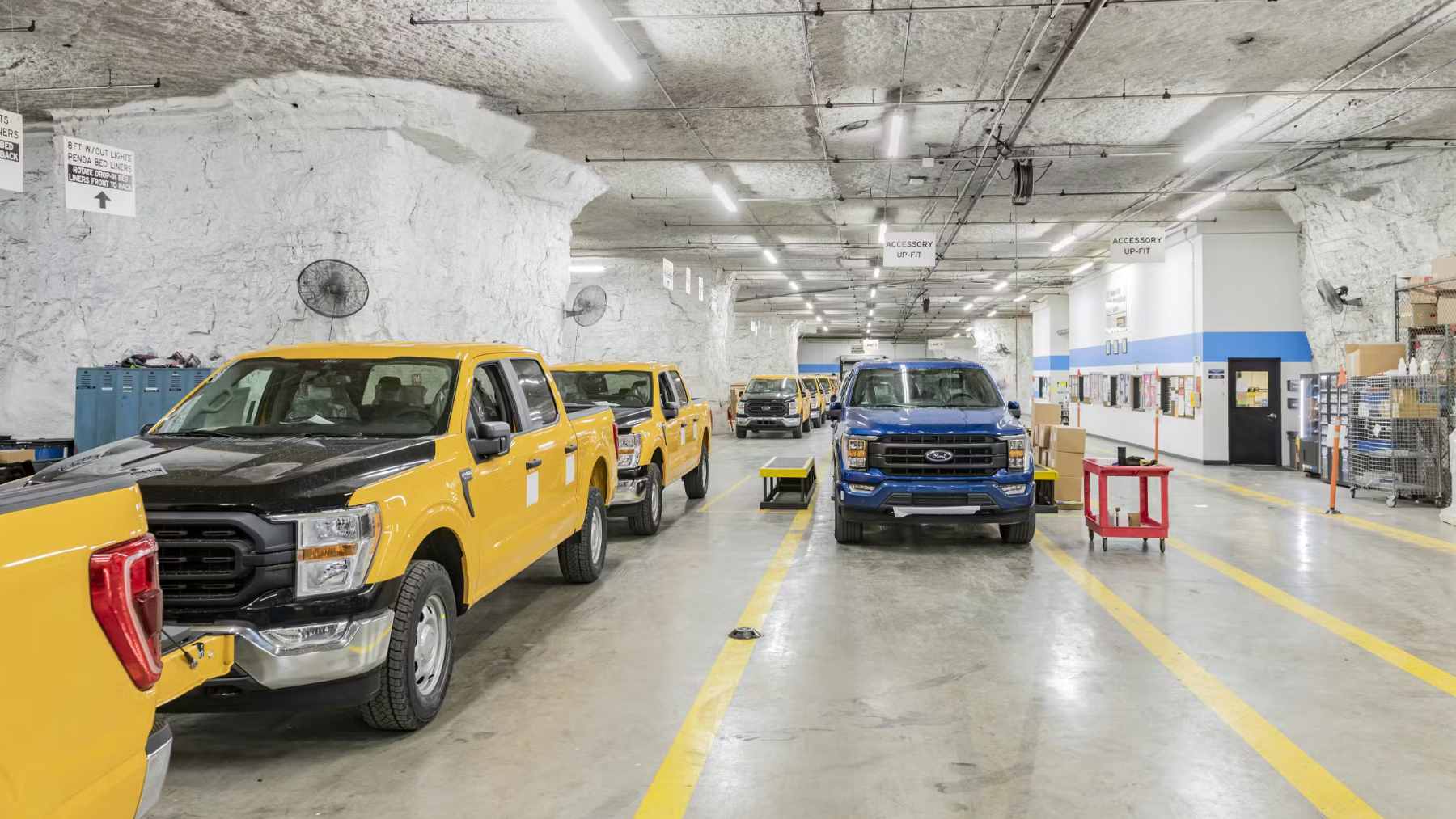 Rows of Ford Maverick cars parked inside the SubTropolis limestone mine beneath Kansas City during the 1970s inventory storage program.