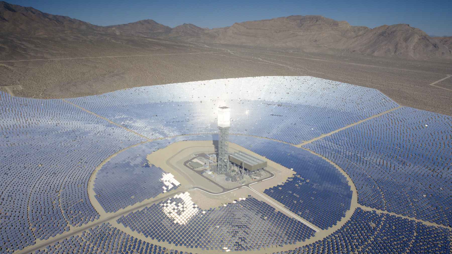 Aerial view of the Ivanpah Solar Electric Generating System, a concentrating solar power plant with mirrored heliostats in the Mojave Desert.