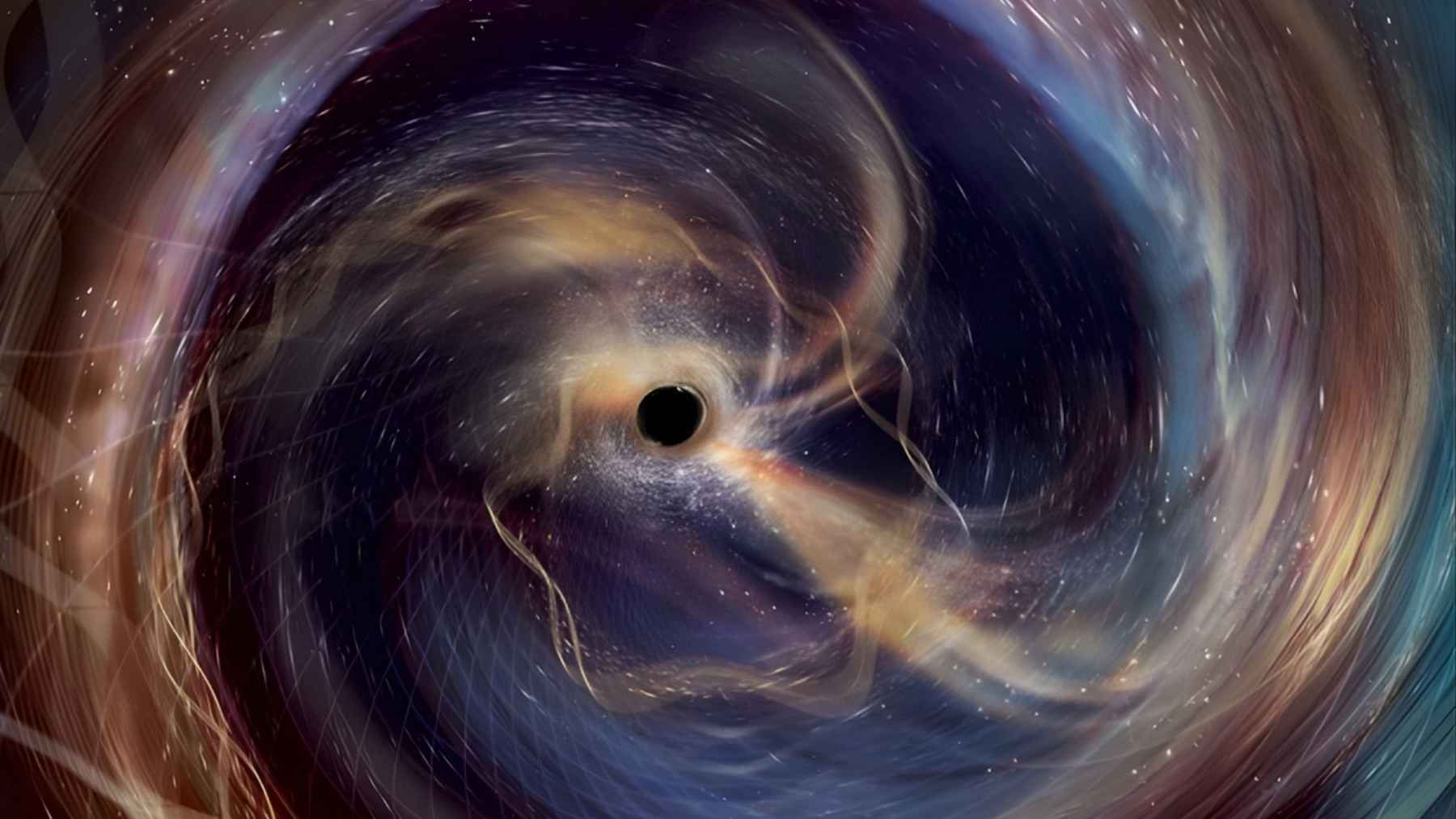 Artist illustration of a black hole merger emitting gravitational waves, shown as swirling light around a dark central horizon.
