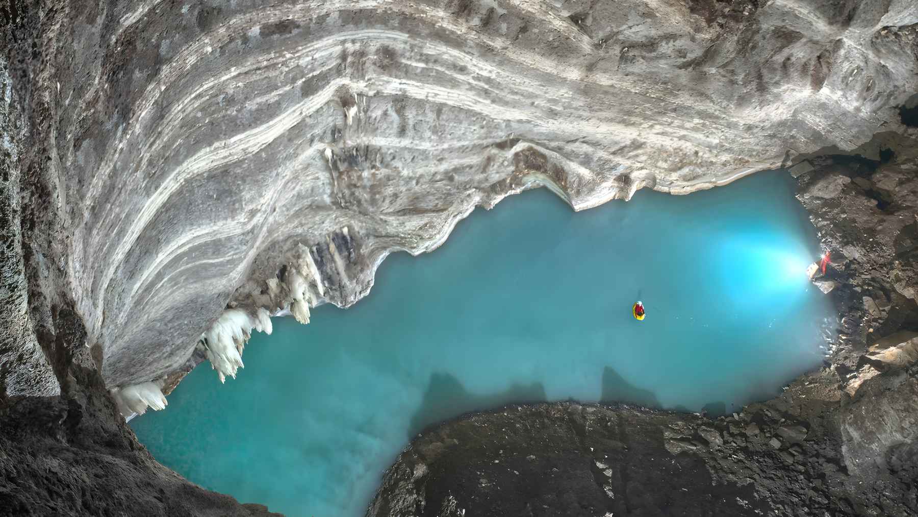 Lake Neuron, a massive underground thermal lake discovered 127 meters deep inside Atmos Cave in Albania.