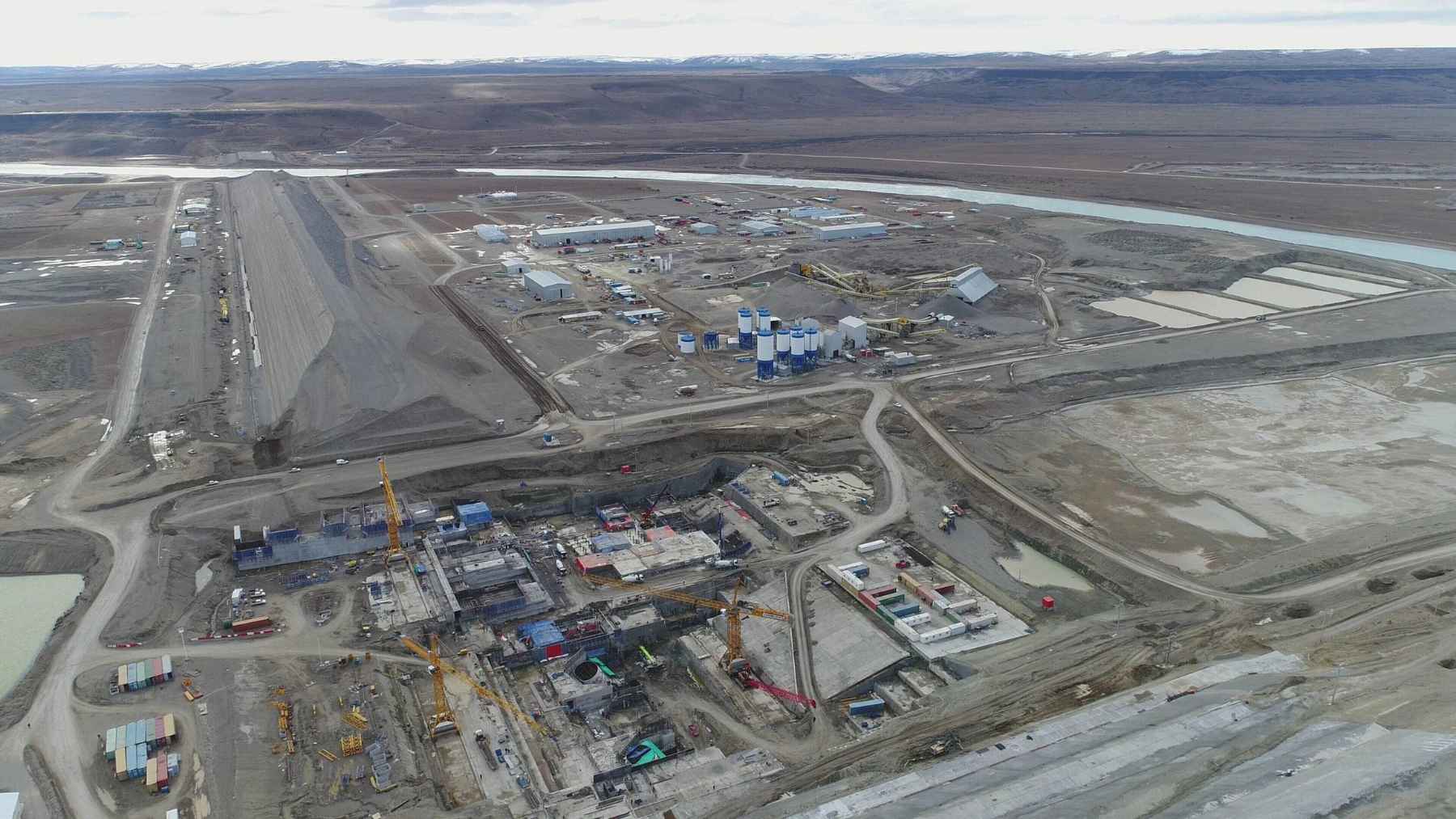 Aerial view of a large hydroelectric dam construction site in Patagonia on Argentina’s Santa Cruz River.