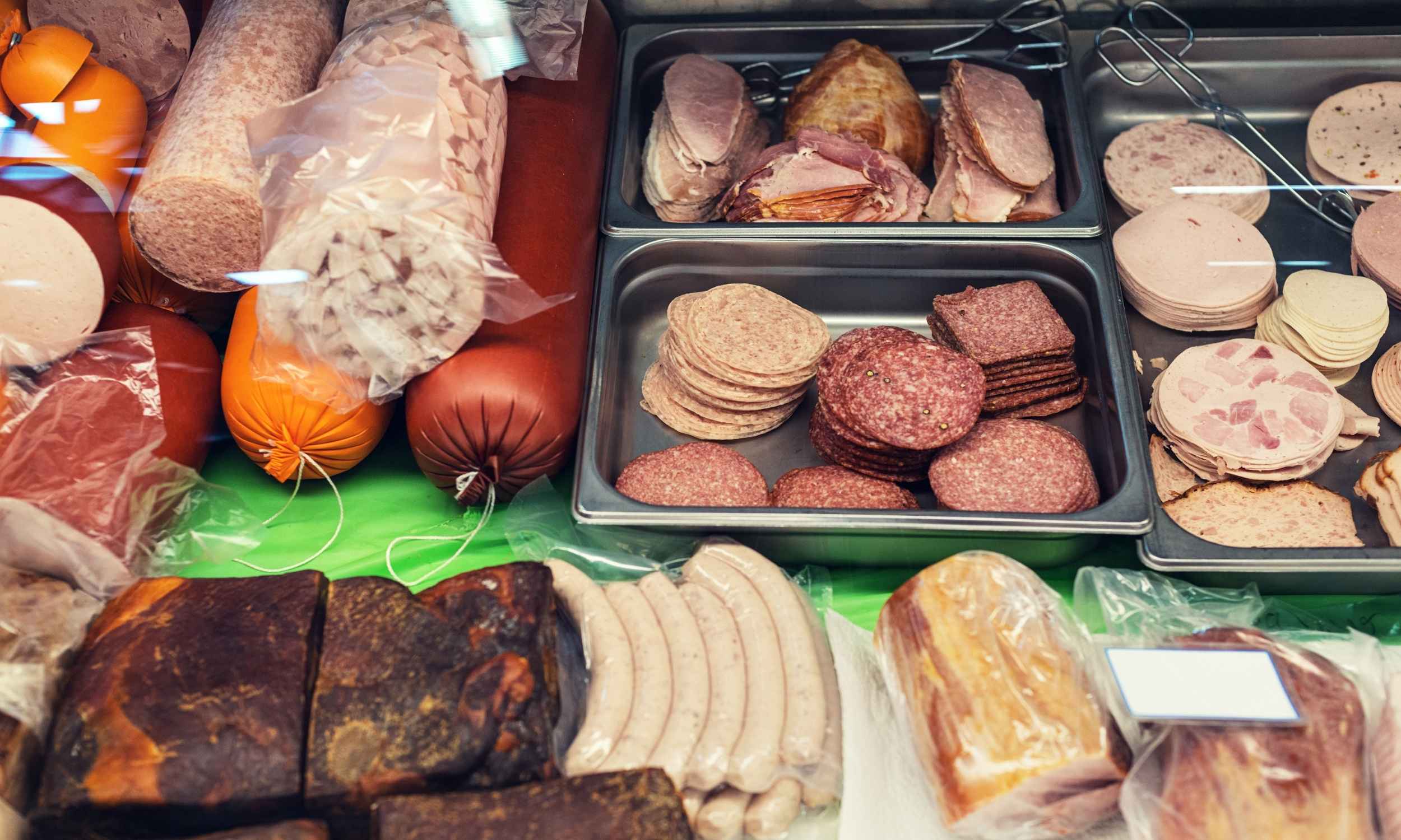 Packaged processed foods and deli meats containing common chemical preservatives