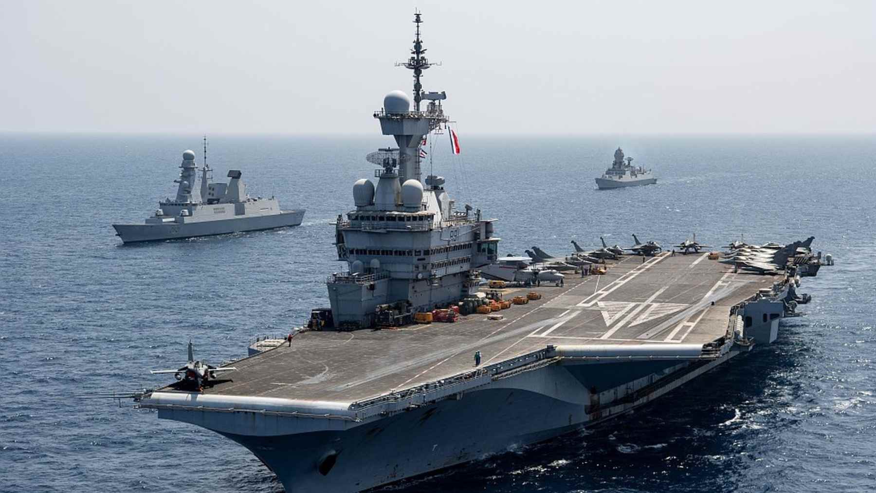 French aircraft carrier Charles de Gaulle at sea with escort warships during Exercise ORION 26 in the North Atlantic.