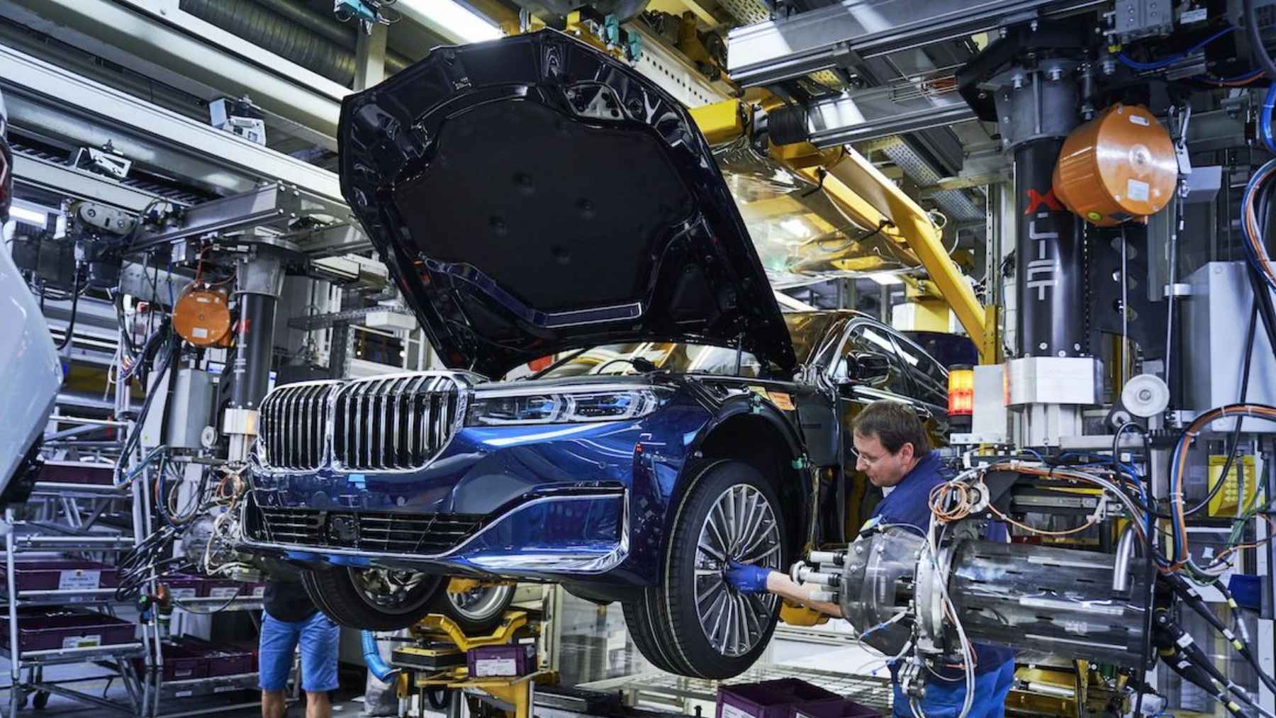 BMW, Mercedes Benz, and Volkswagen vehicles parked together as Germany’s auto industry faces restructuring fears