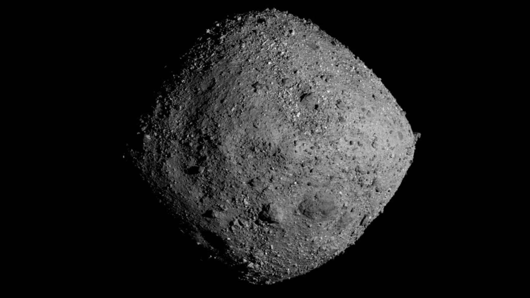 NASA image of asteroid Bennu, a rubble-pile near-Earth asteroid, shown as a rocky gray sphere against black space.
