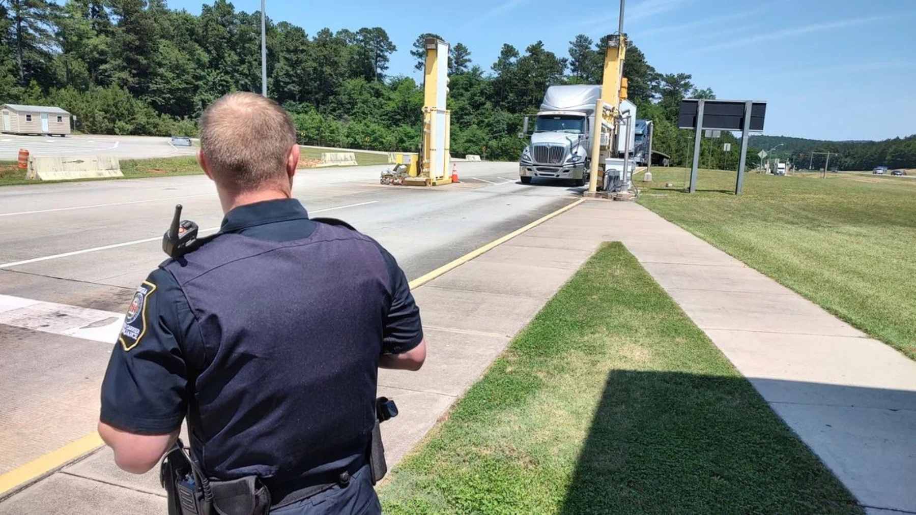 A “Weigh Station” road sign in North Carolina directing commercial trucks to inspection and compliance checkpoints
