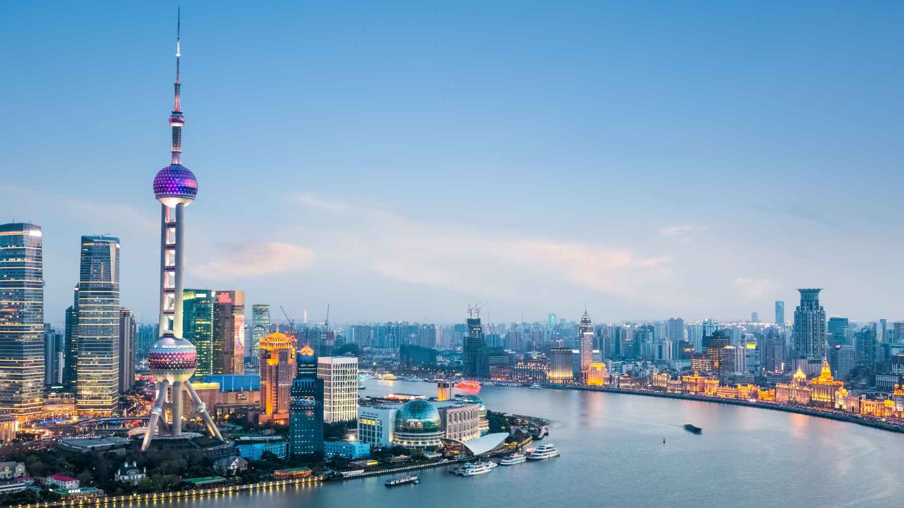 Shanghai skyline over the Huangpu River, with the Oriental Pearl Tower in Pudong, as the city battles land subsidence.