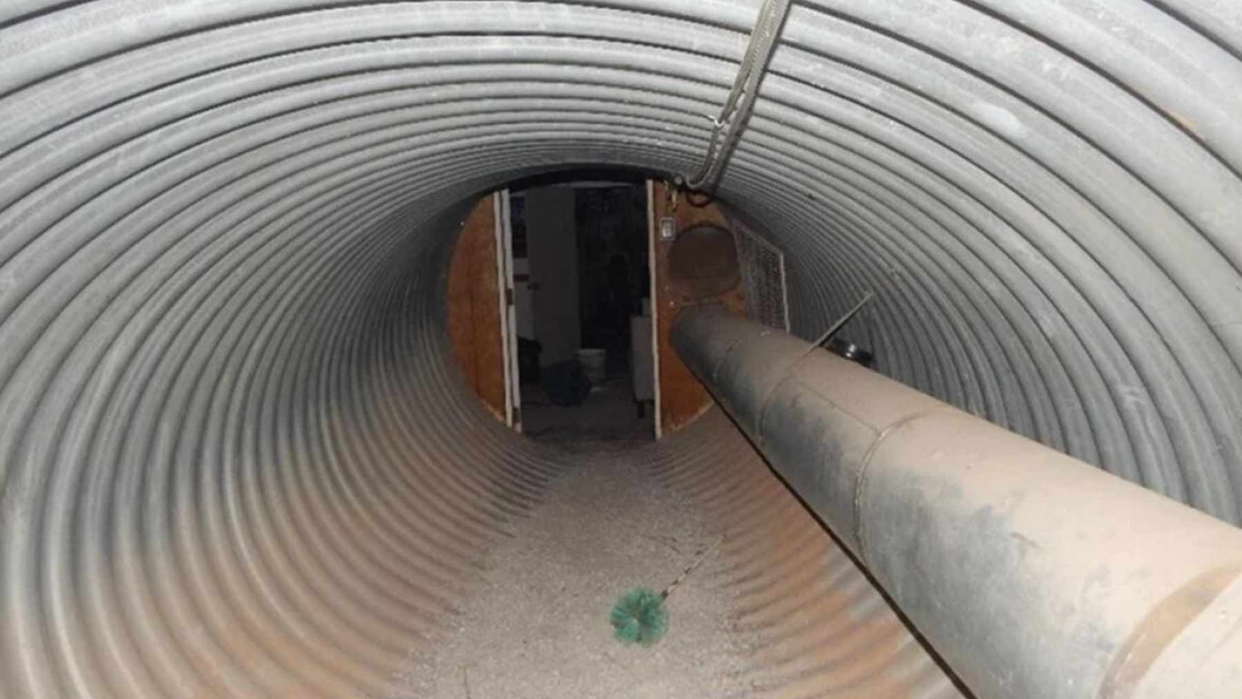 Interior of underground tunnel leading to hidden bunker in Anderson, California, where illegal firearms and ammo were discovered