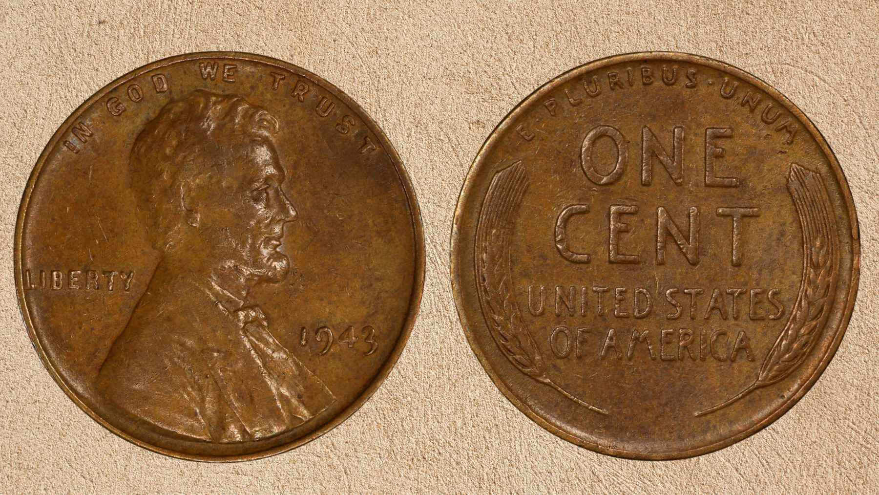 Front and back views of a rare 1943 Lincoln cent, the famous bronze error coin long known as the 1943 copper penny