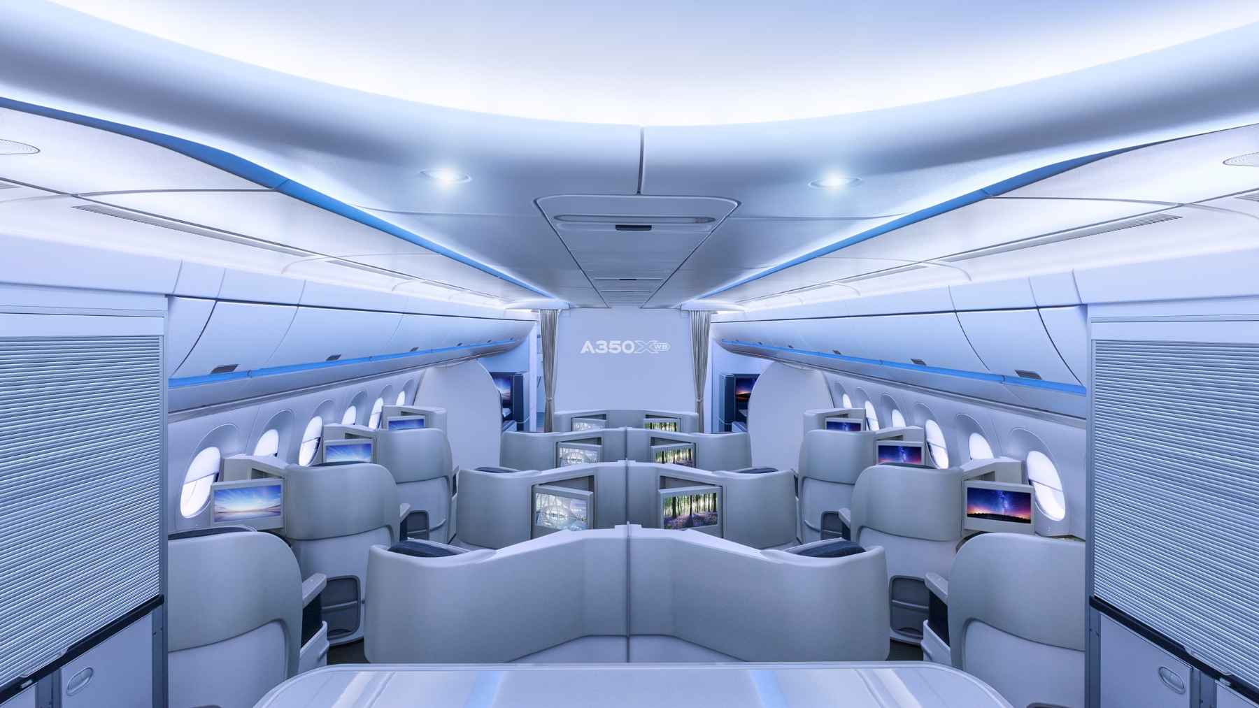 Interior of an Airbus A350-1000 Airspace cabin featuring modern business class seating designed for ultra long haul flights.