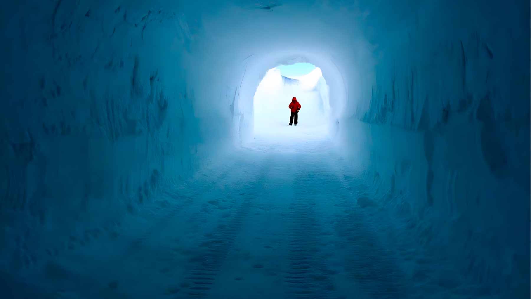 A view inside the 35-meter-long Ice Memory sanctuary, a snow-carved vault in Antarctica containing rows of archived mountain ice cores.