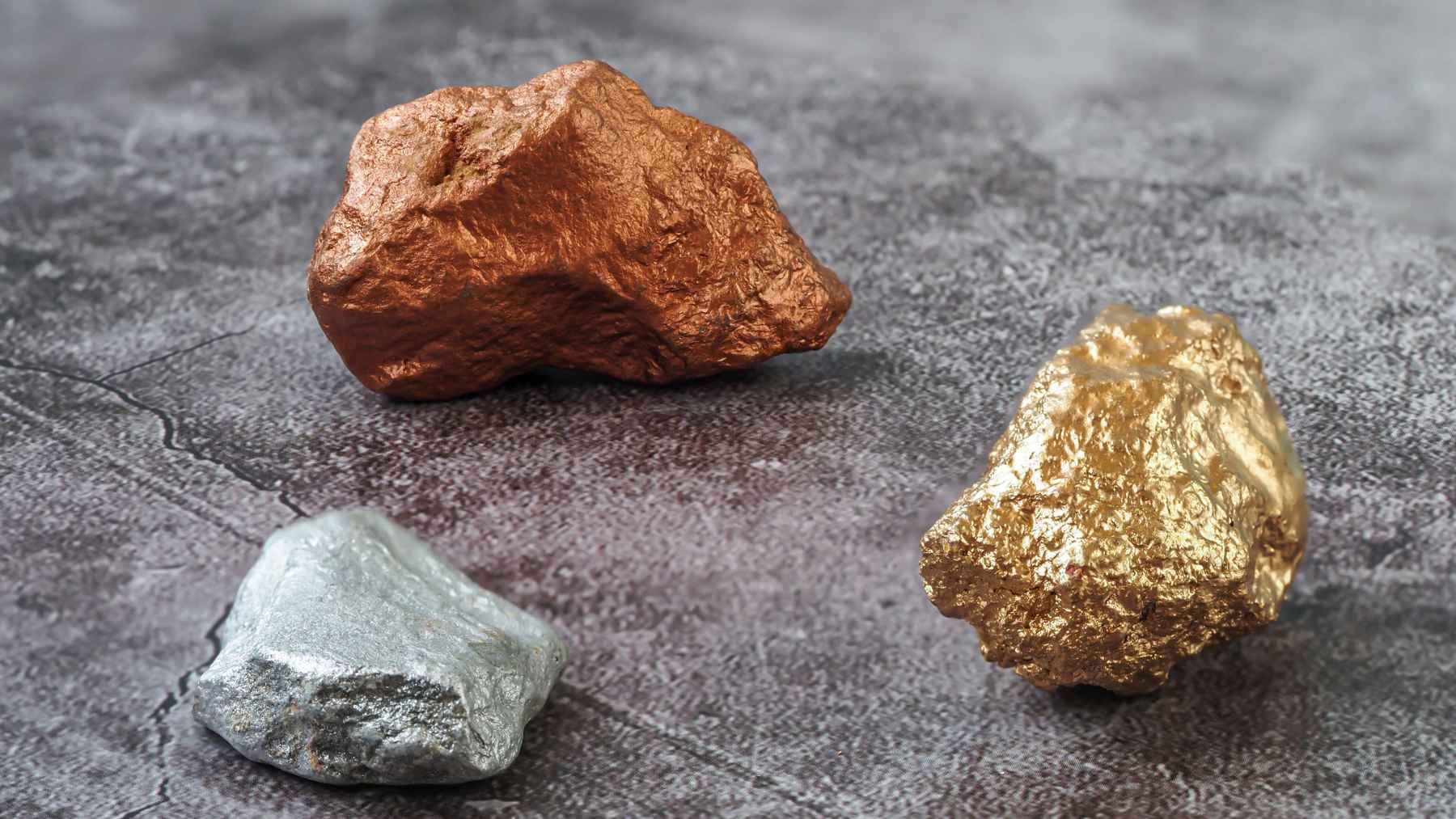 Copper, gold, and silver rocks representing the major Andes discovery on the Argentina-Chile border