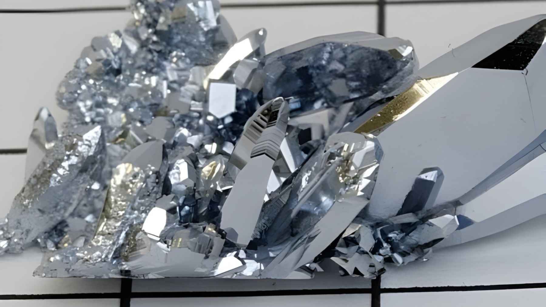Close-up of metallic californium crystals, the synthetic radioactive material considered one of the most expensive substances on Earth