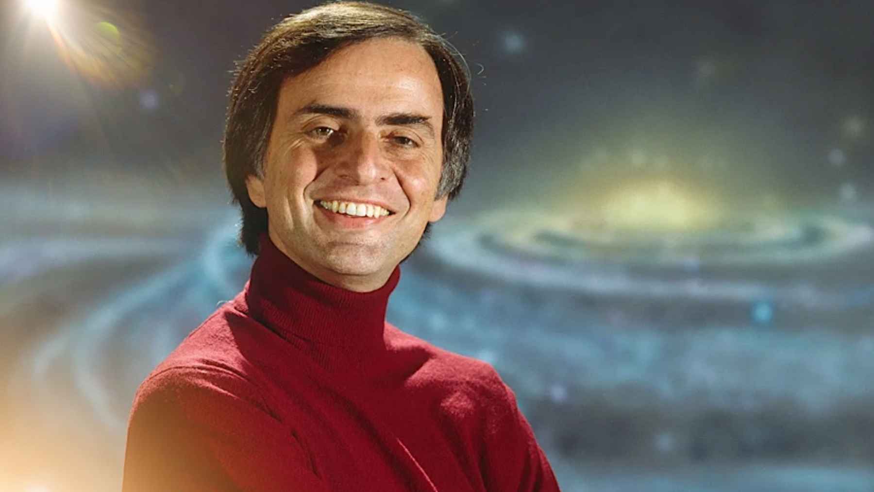 Carl Sagan smiling in front of a cosmic background, reflecting on his idea that the universe is indifferent to humanity
