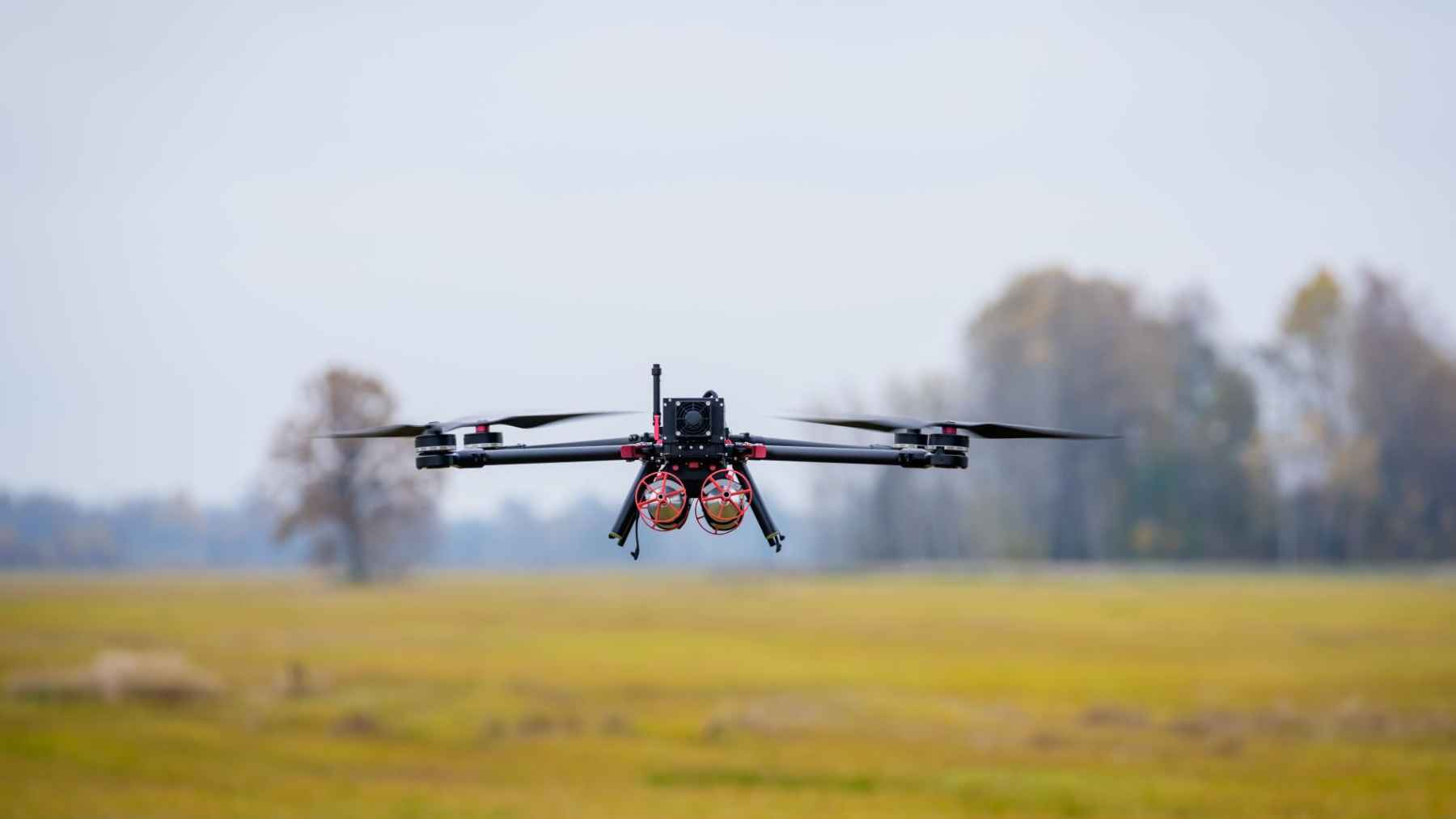 Counter-drone defense system targeting an unmanned aerial vehicle using radar or laser technology near protected airspace.