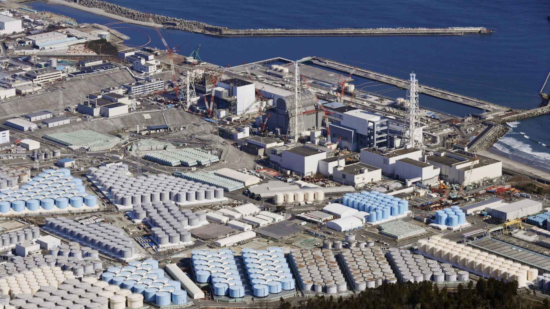 Aerial view of the Fukushima Daiichi nuclear power plant, illustrating research on microbial life found in highly radioactive reactor water.