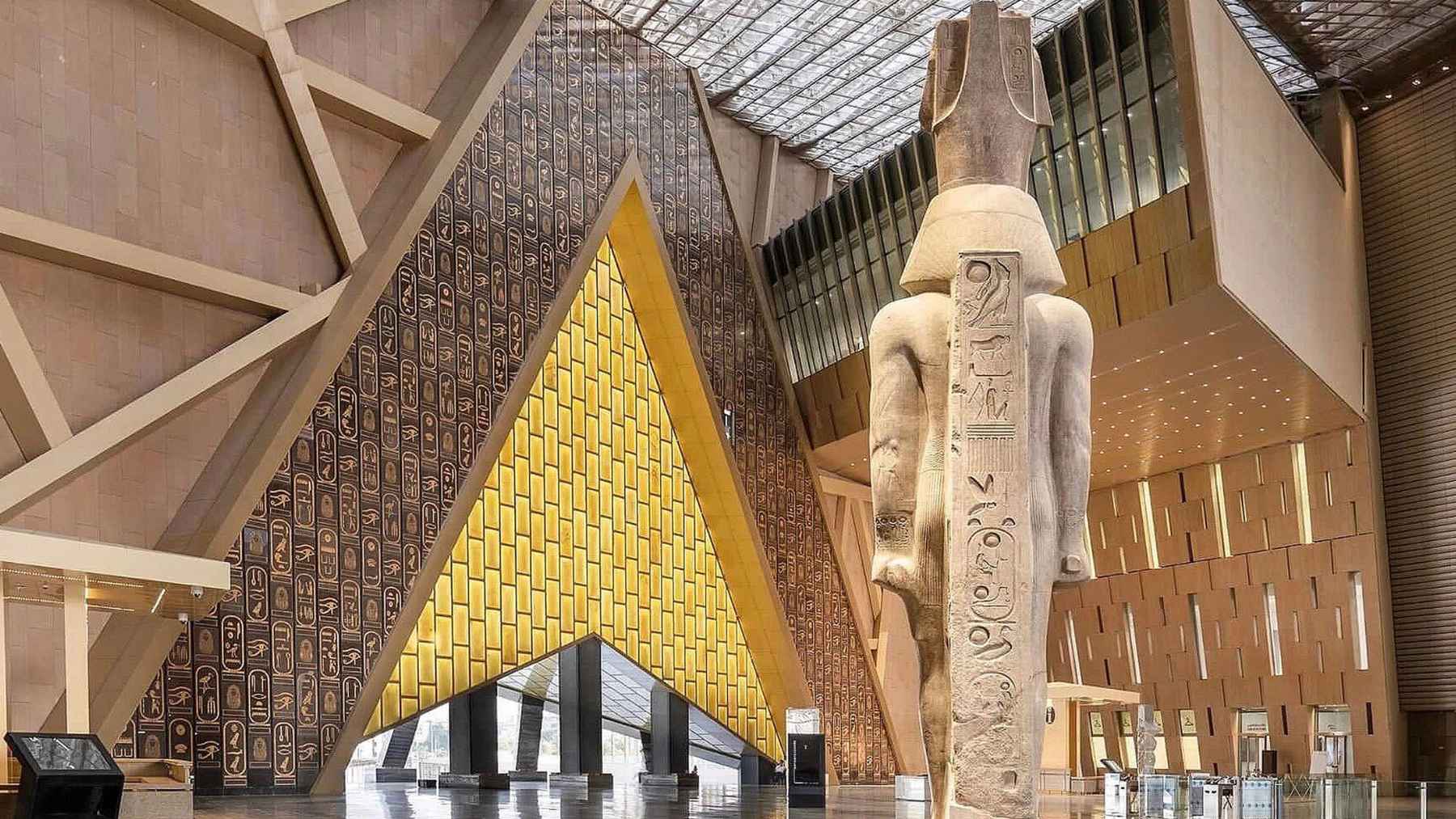 Grand Egyptian Museum exterior near the Pyramids of Giza during its official opening ceremony