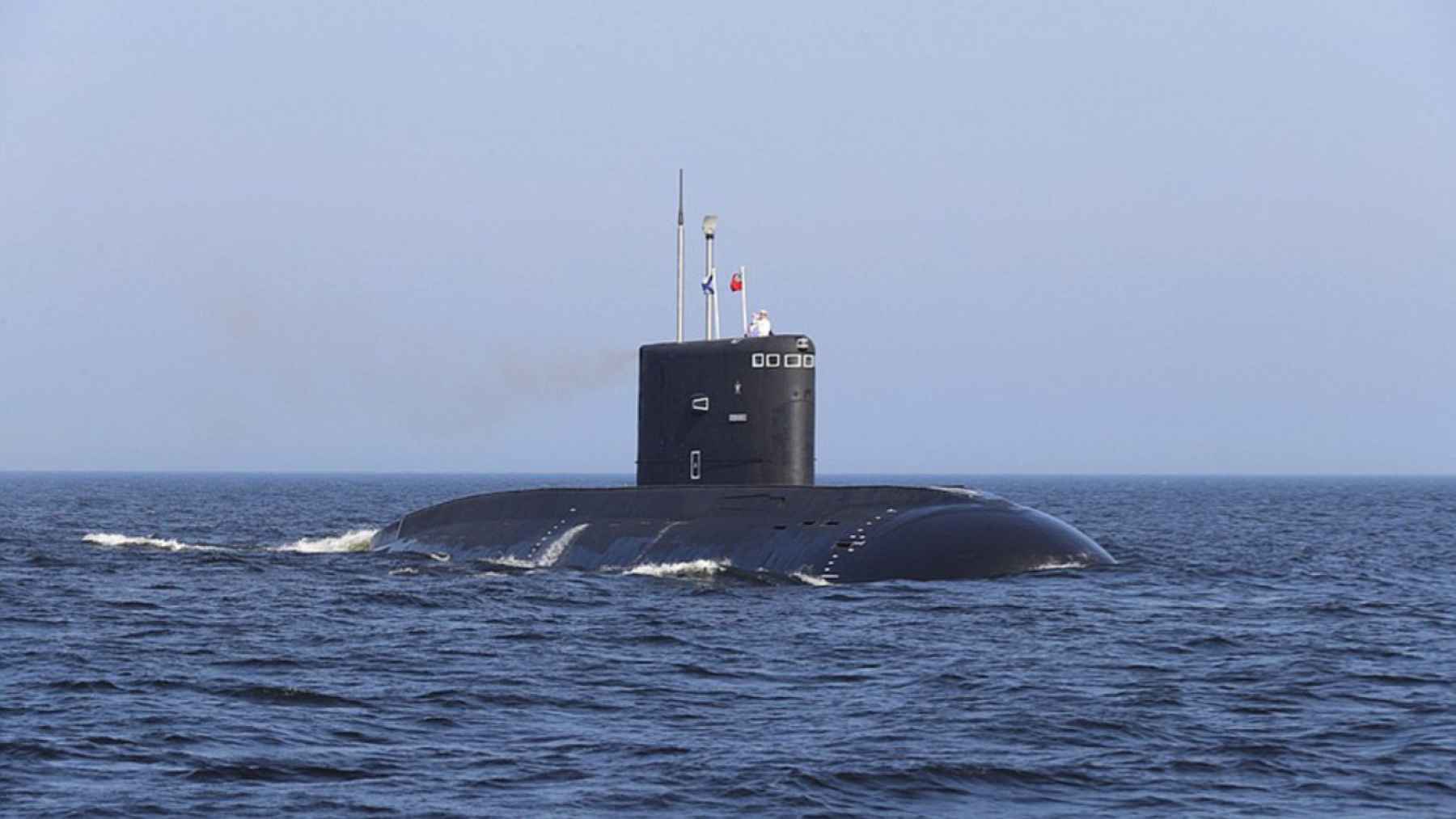 Iranian Kilo-class submarine sailing on the surface, illustrating renewed naval activity in the Persian Gulf