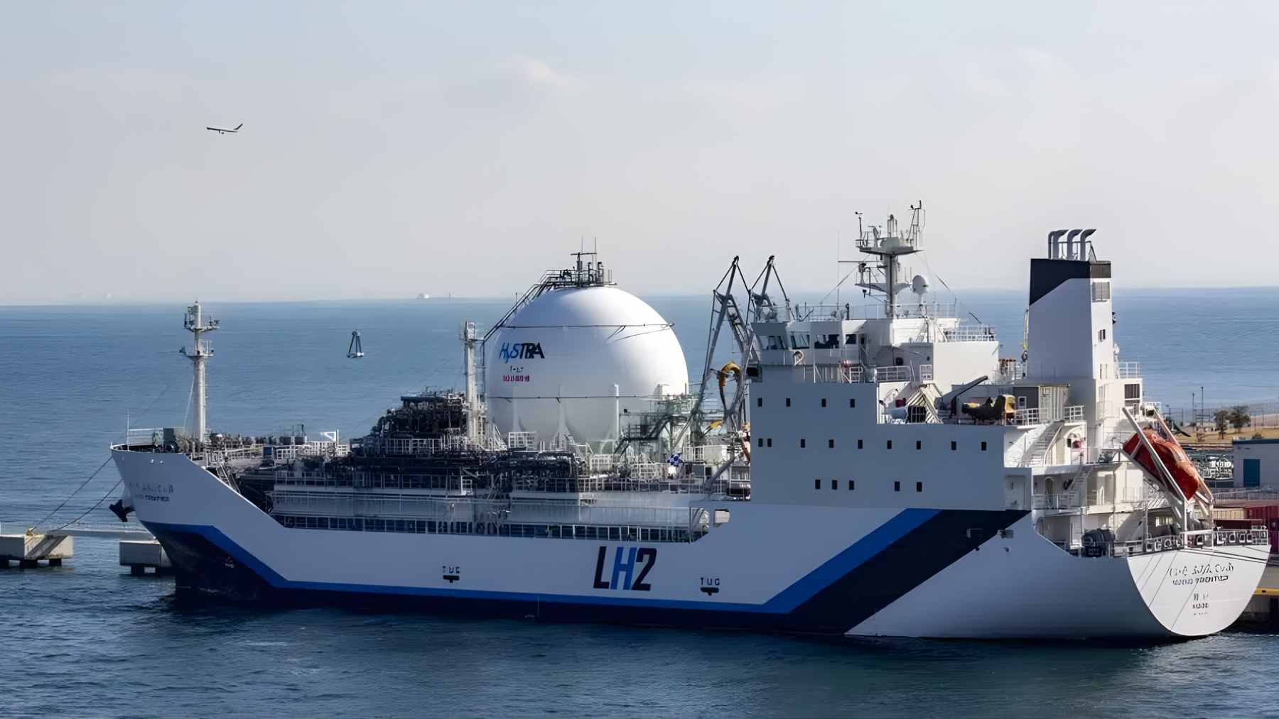 A high-output Kawasaki KG-series gas engine modified for 30 percent hydrogen co-firing in an industrial power plant setting.