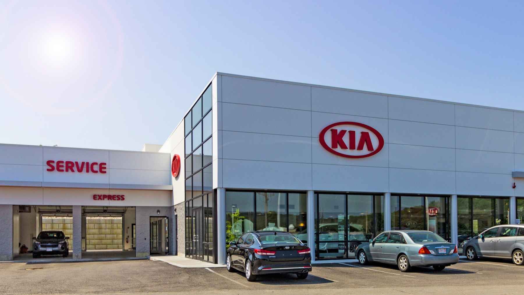Kia dealership and service center exterior, illustrating the warranty dispute over a 2019 Kia Optima engine failure