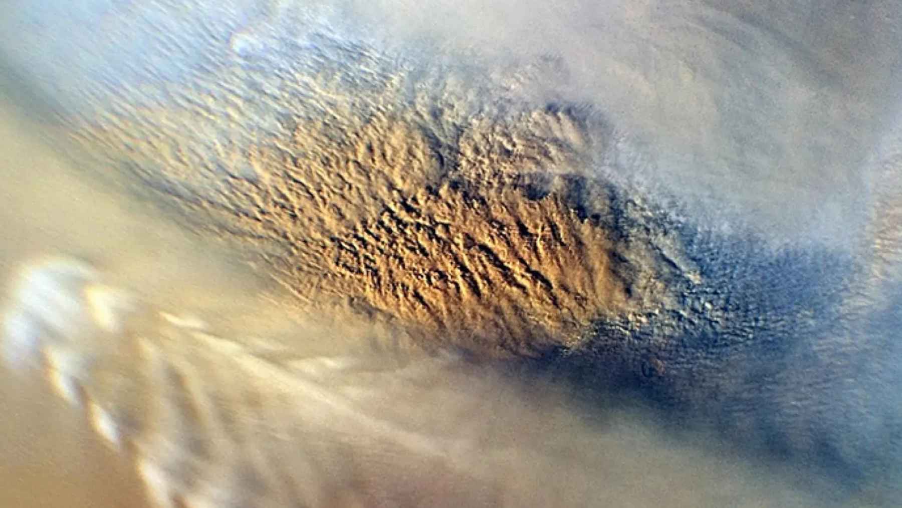 Close-up of Martian surface with dust storm patterns driving electrostatic chemical reactions