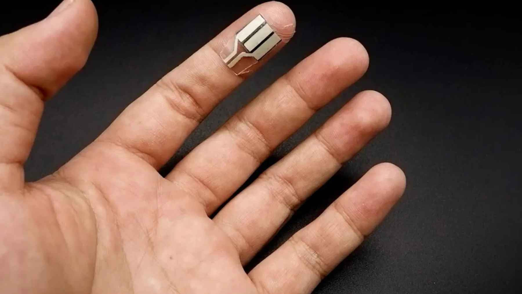A sensor patch worn on a finger that can generate electricity from sweat for battery-free wearables