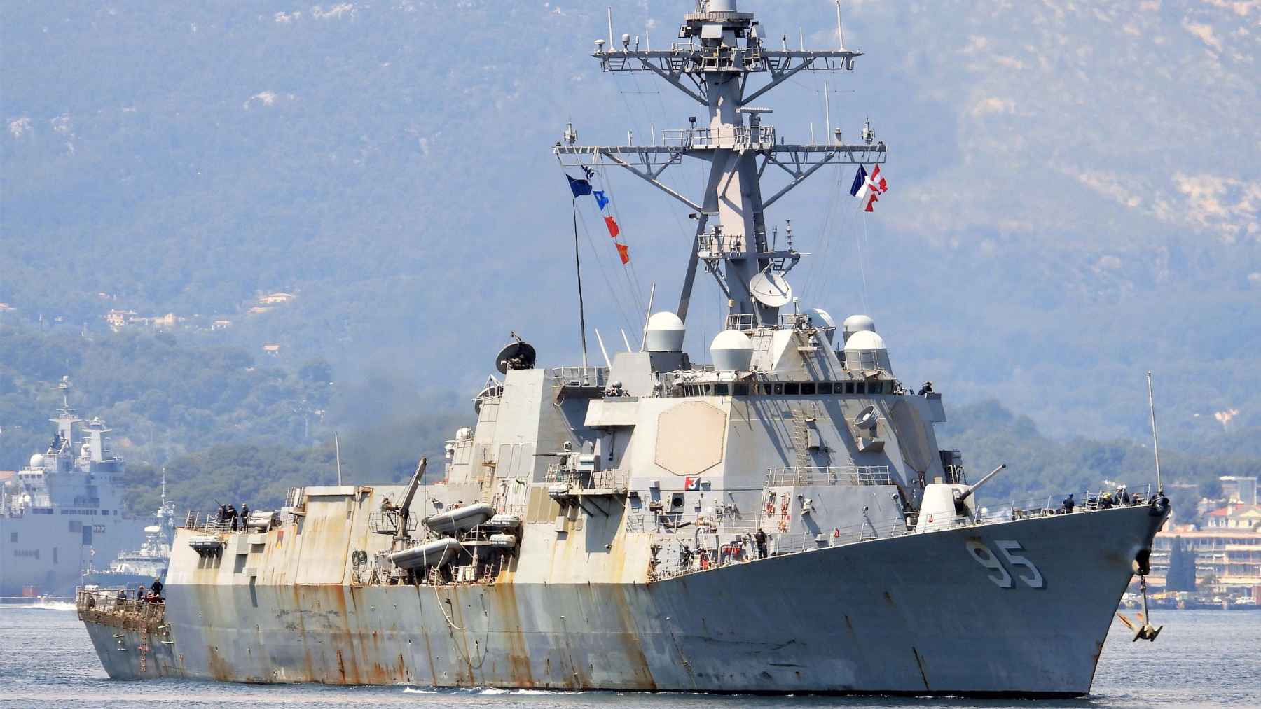 USS Hopper with heavy rust buildup visible on its superstructure and deck during a U.S. Navy maintenance concern
