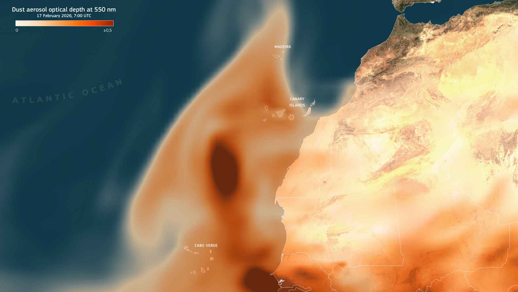 Satellite view of the Atlantic Ocean showing a विशाल belt of brown sargassum seaweed stretching from West Africa toward the Caribbean.