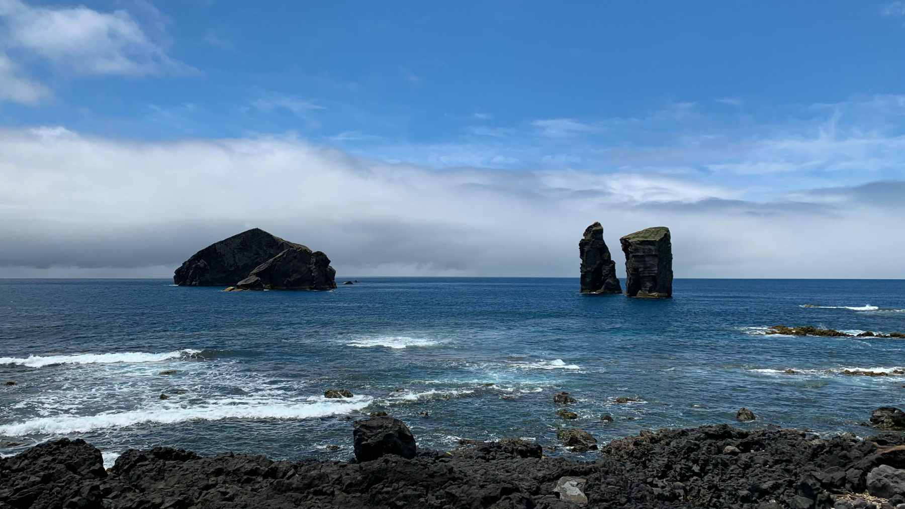An offshore drilling vessel operating in the Atlantic Ocean to extract core samples from the continental shelf.