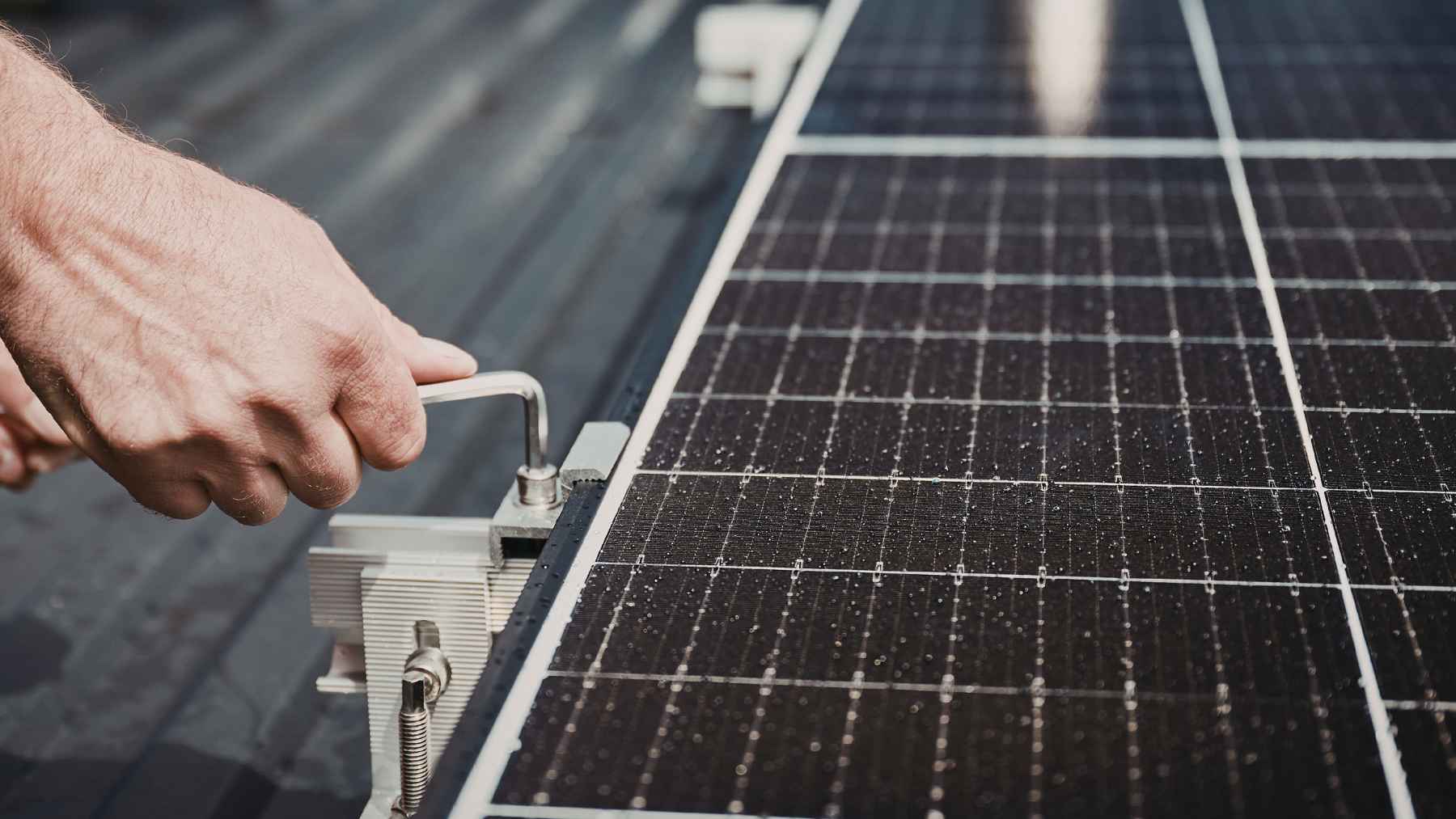 Solar panels installed on an apartment balcony highlighting legal disputes over residential renewable energy use