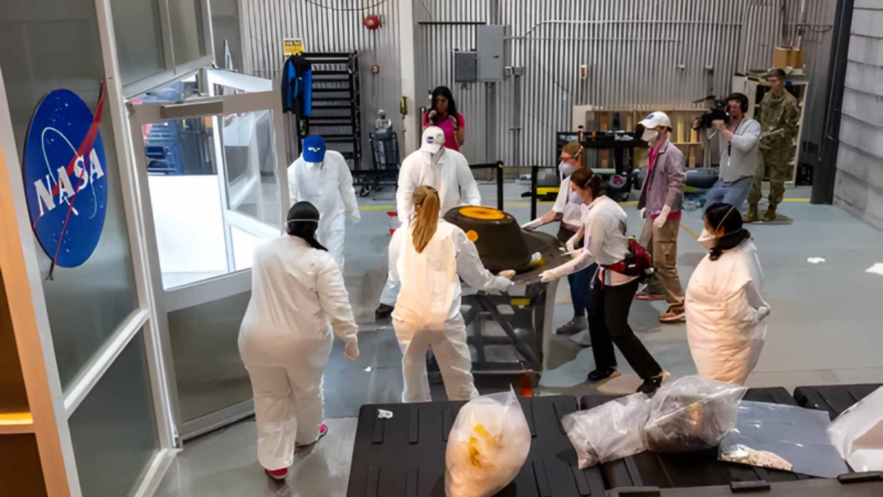 Samples from the asteroid Bennu force us to rethink the origin of life: NASA finds key compounds in rocks over 4.5 billion years old 1 A high-resolution close-up of a dark, carbon-rich rocky sample from asteroid Bennu held in a NASA laboratory setting.