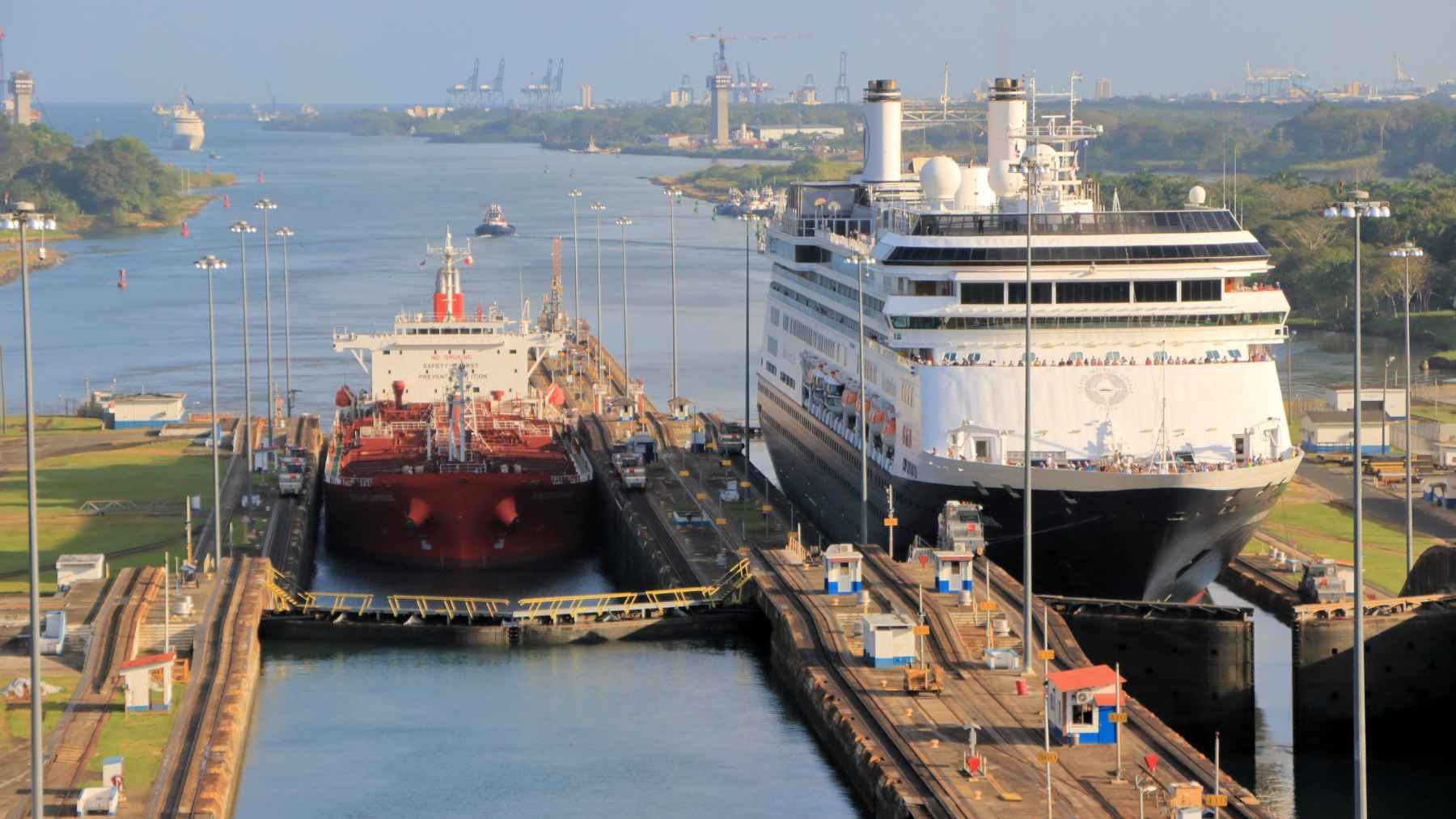 Cargo ships transiting the Panama Canal amid increased traffic and global shipping disruptions