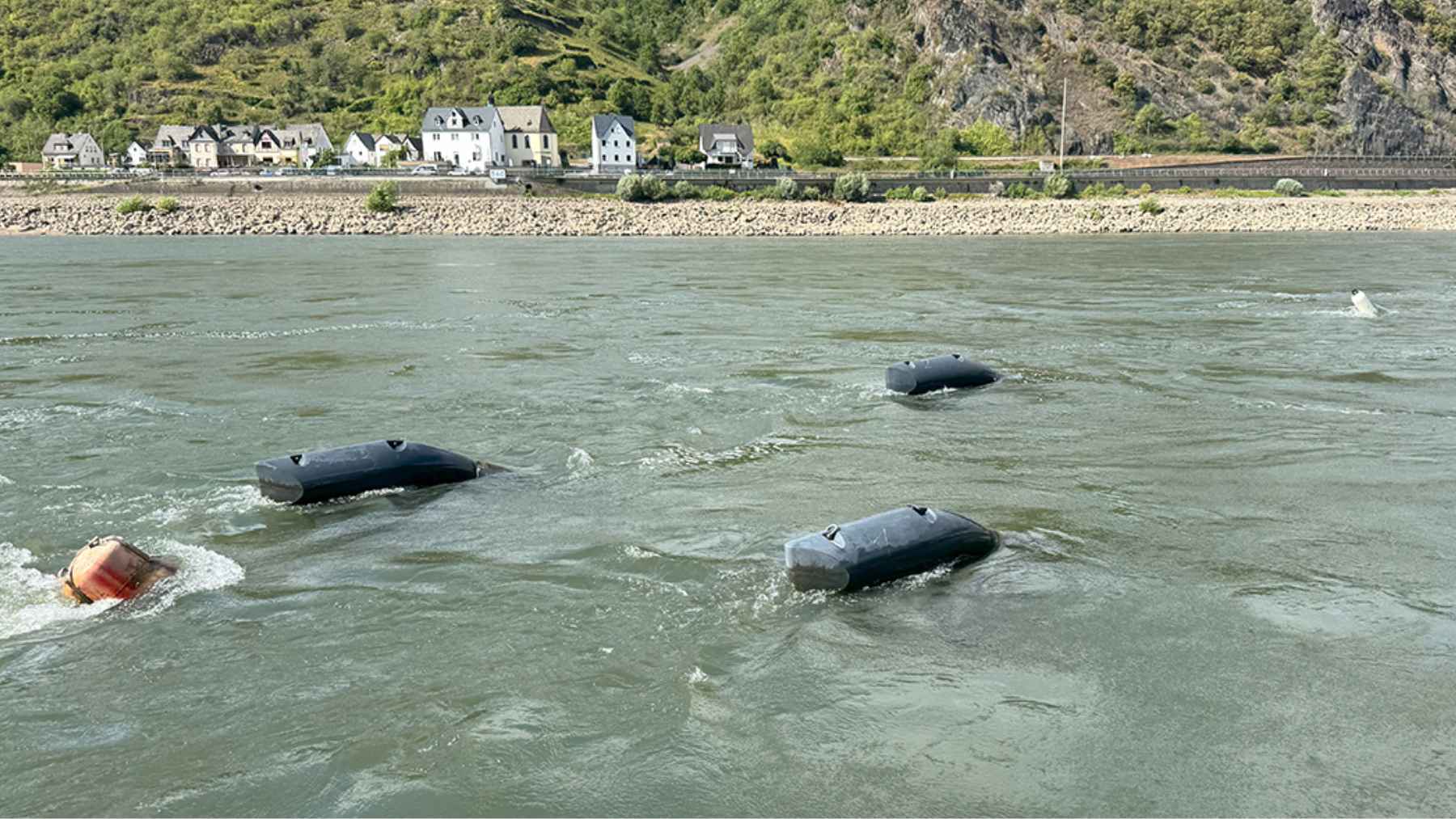 Hydrokinetic turbines installed in the Rhine River generating electricity from flowing water without a dam