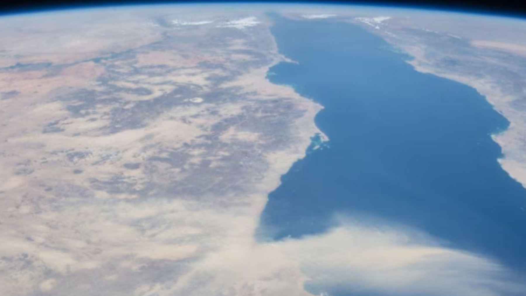Illustration of tectonic plate fragmentation beneath Earth’s surface showing cracks and separation zones