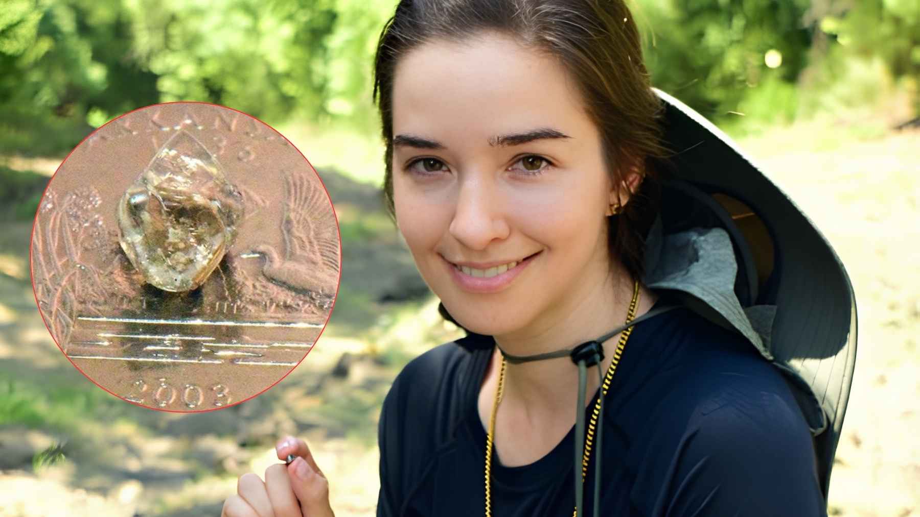A visitor at Crater of Diamonds State Park holds a small diamond found during a search in Arkansas.