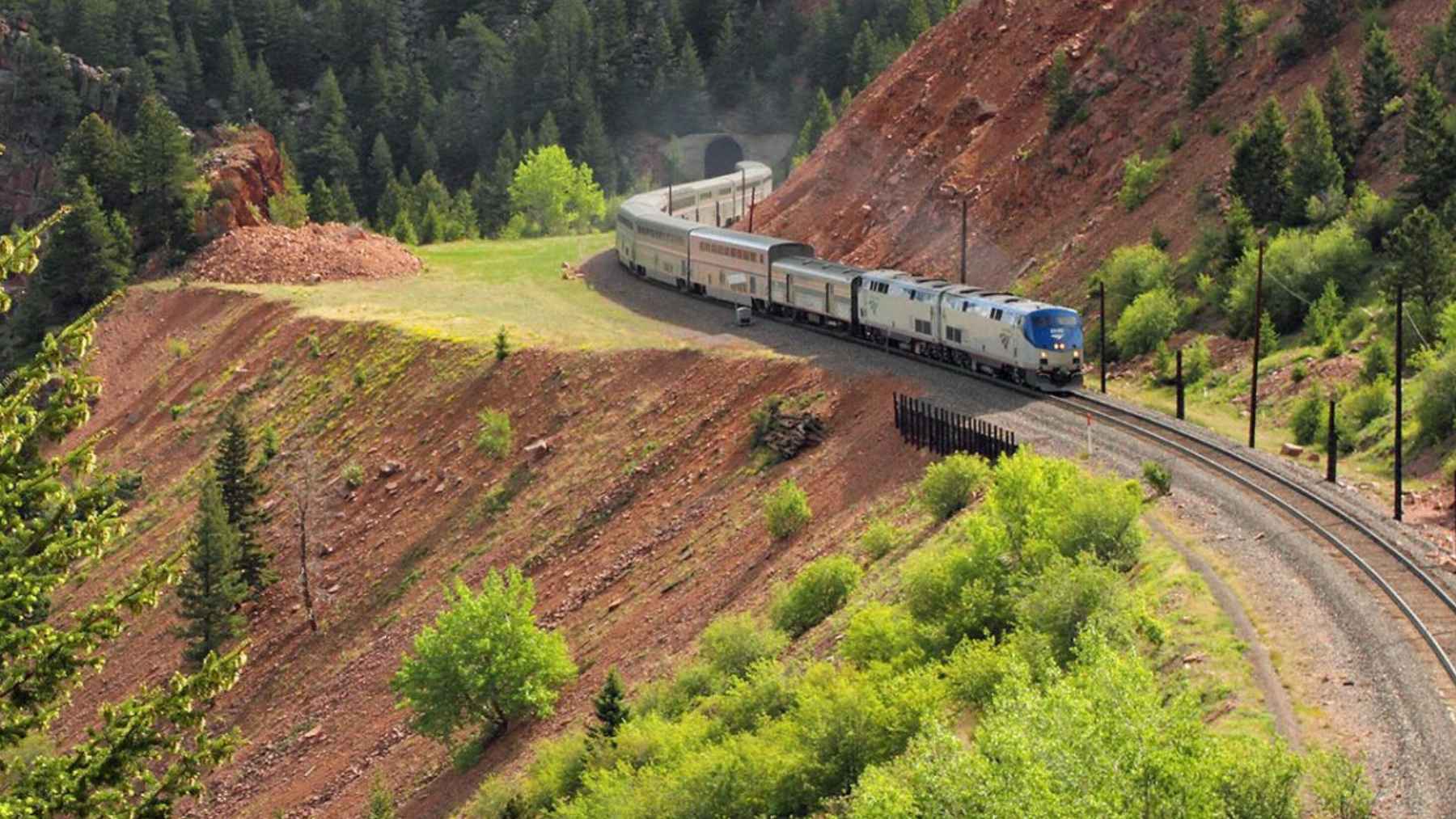 Amtrak California Zephyr passenger train traveling through the Rocky Mountains during its cross-country route