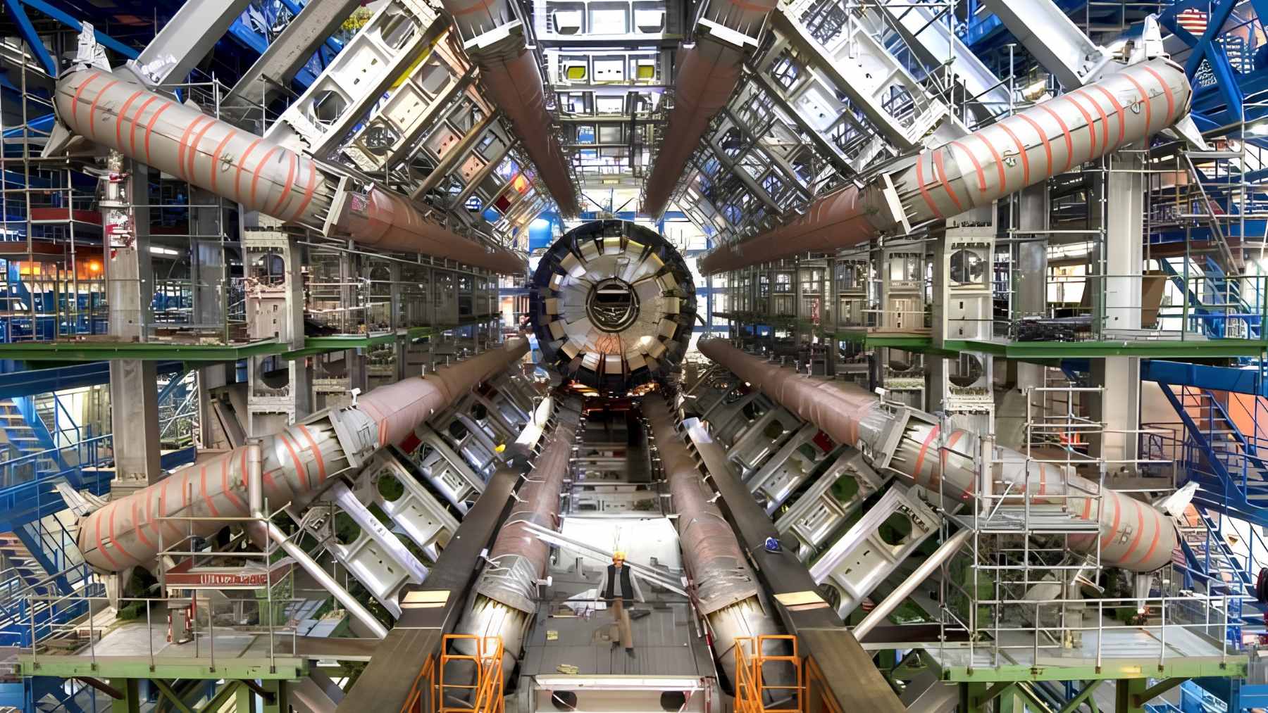 A view inside the Large Hadron Collider’s tunnel, showing the 17-mile ring of superconducting magnets used for particle collisions.