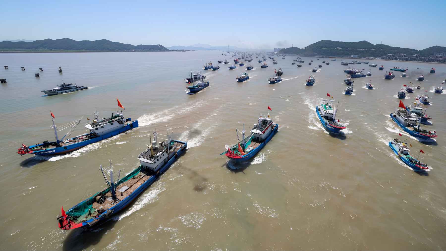 Large Chinese fishing fleet moving through the East China Sea, linked to concerns over maritime pressure and ocean security.