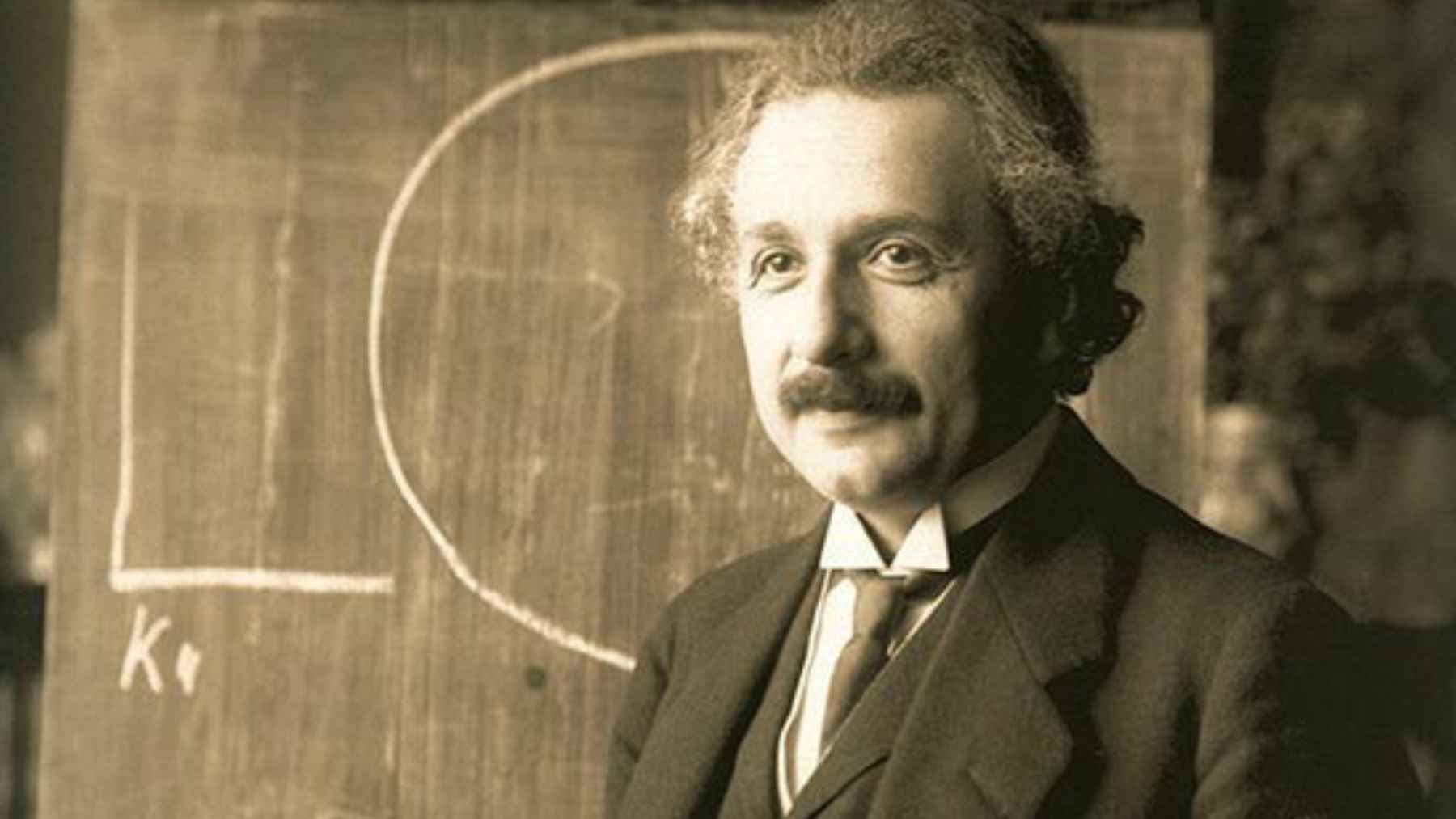 Person riding a bicycle in motion symbolizing balance and the meaning behind Albert Einstein’s famous life quote