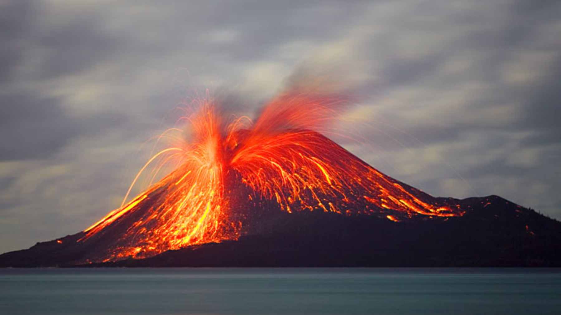 Nuclear blasts can go unnoticed from 1,000 km away, but the loudest sound ever recorded was heard 4,800 km away and circled the planet four times, a physics oddity that still stuns 1 Historical illustration of the 1883 Krakatoa eruption showing massive ash plumes and atmospheric shock waves radiating outward.