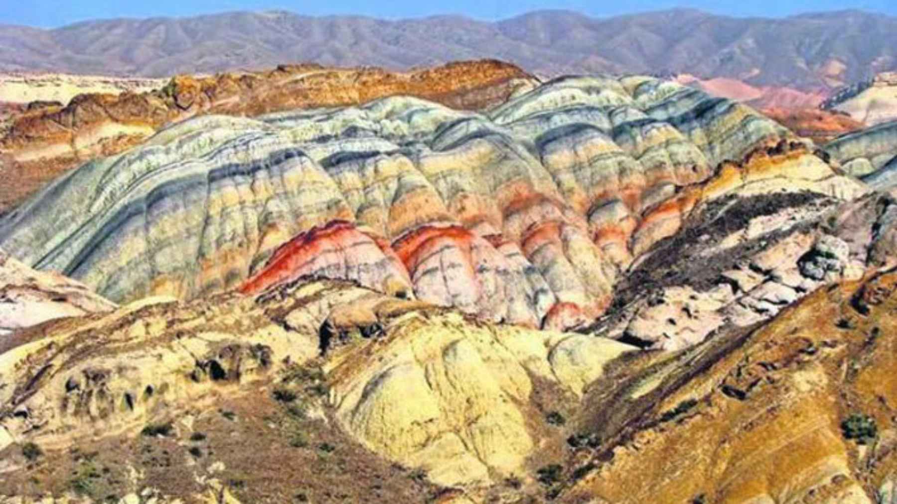 Colorful rock formations in Kyrgyzstan’s Madygen Formation linked to Triassic wildfire fossil discoveries