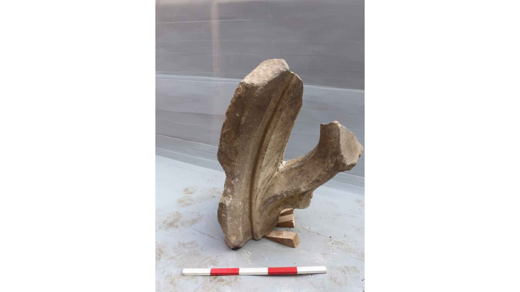 Carved medieval stone arch fragment uncovered during archaeological excavations beneath a former Gloucester shopping center