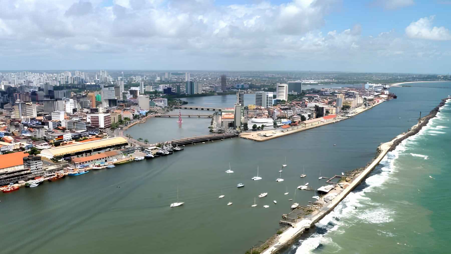 ECOnews 1 Aerial view of the Port of Recife in Brazil, showing the urban harbor, navigation channel, and coastal breakwater.
