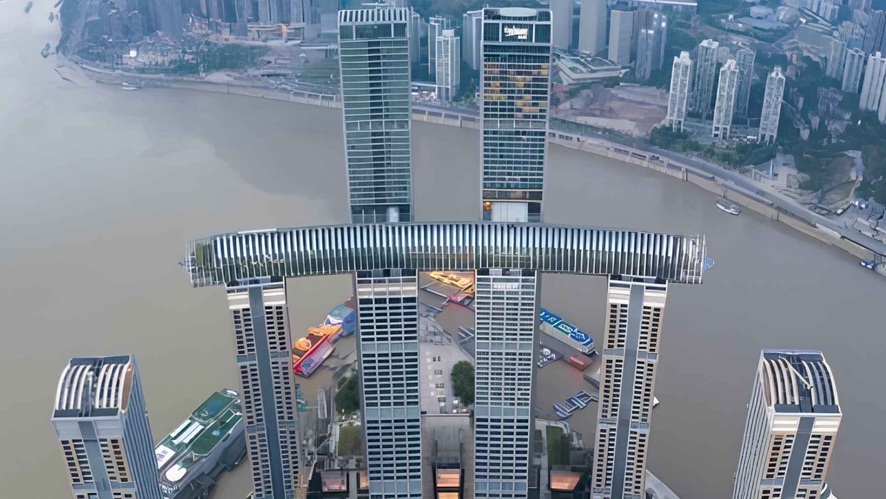 Aerial view of Raffles City Chongqing showing The Crystal, a horizontal skyscraper linking multiple towers high above the city.