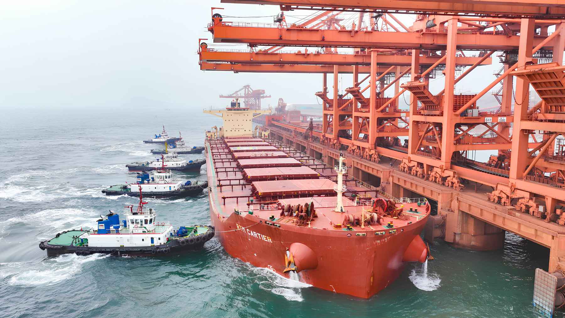 Iron ore transport and export operations linked to Guinea’s Simandou mining project and Chinese steel supply